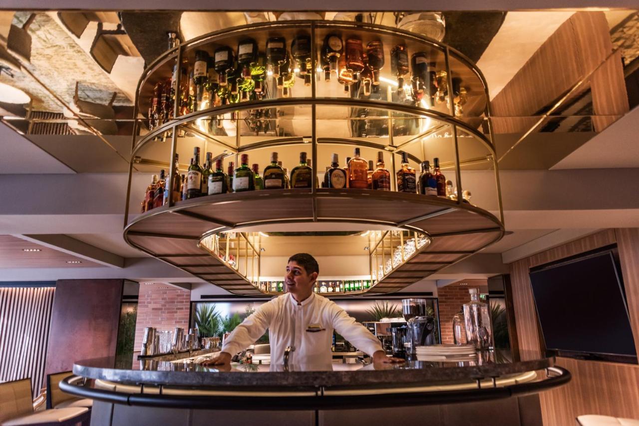 Hotel Estelar La Fontana โบโกตา ภายนอก รูปภาพ The bar at the 1919