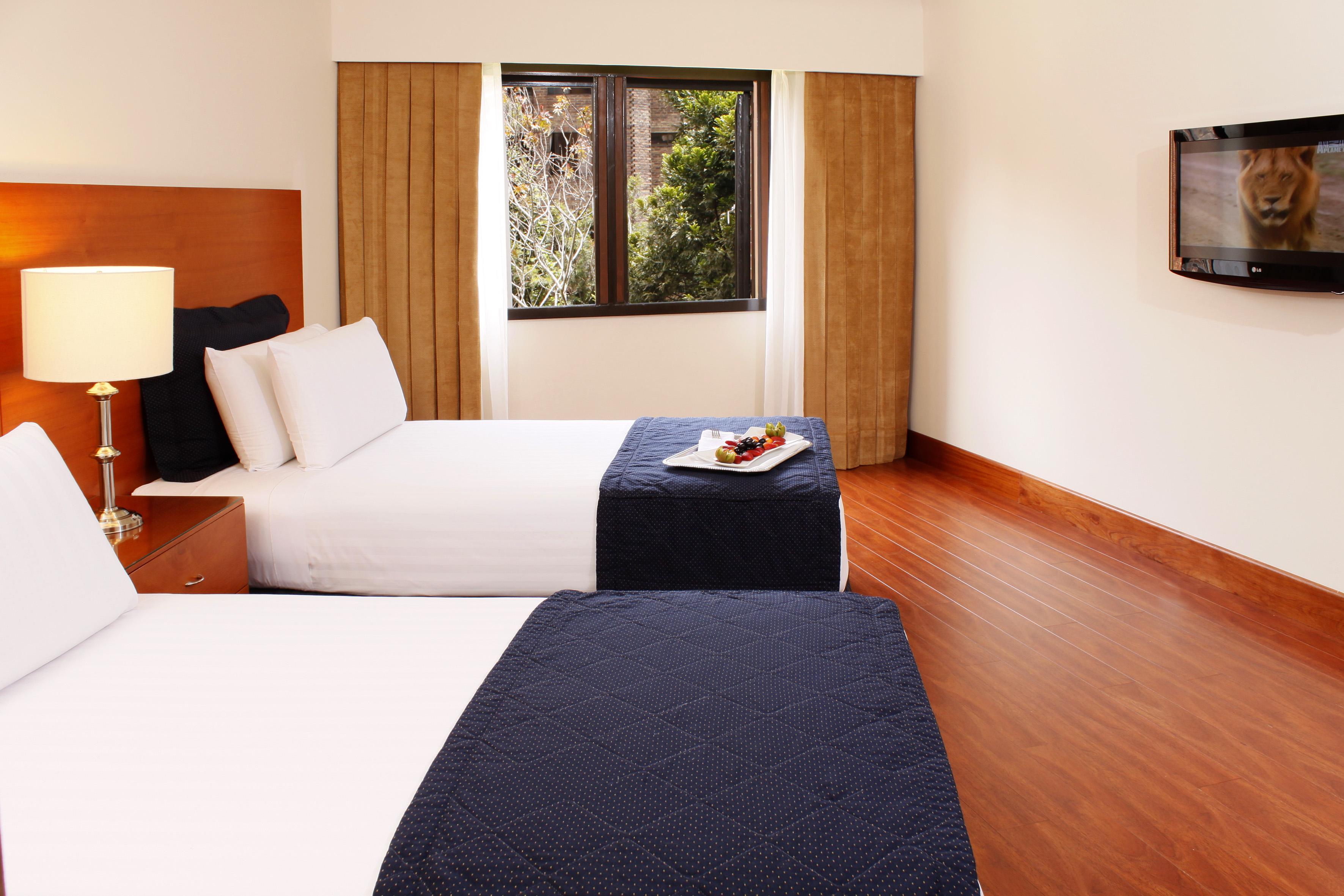 Hotel Estelar La Fontana โบโกตา ภายนอก รูปภาพ A room at the hotel